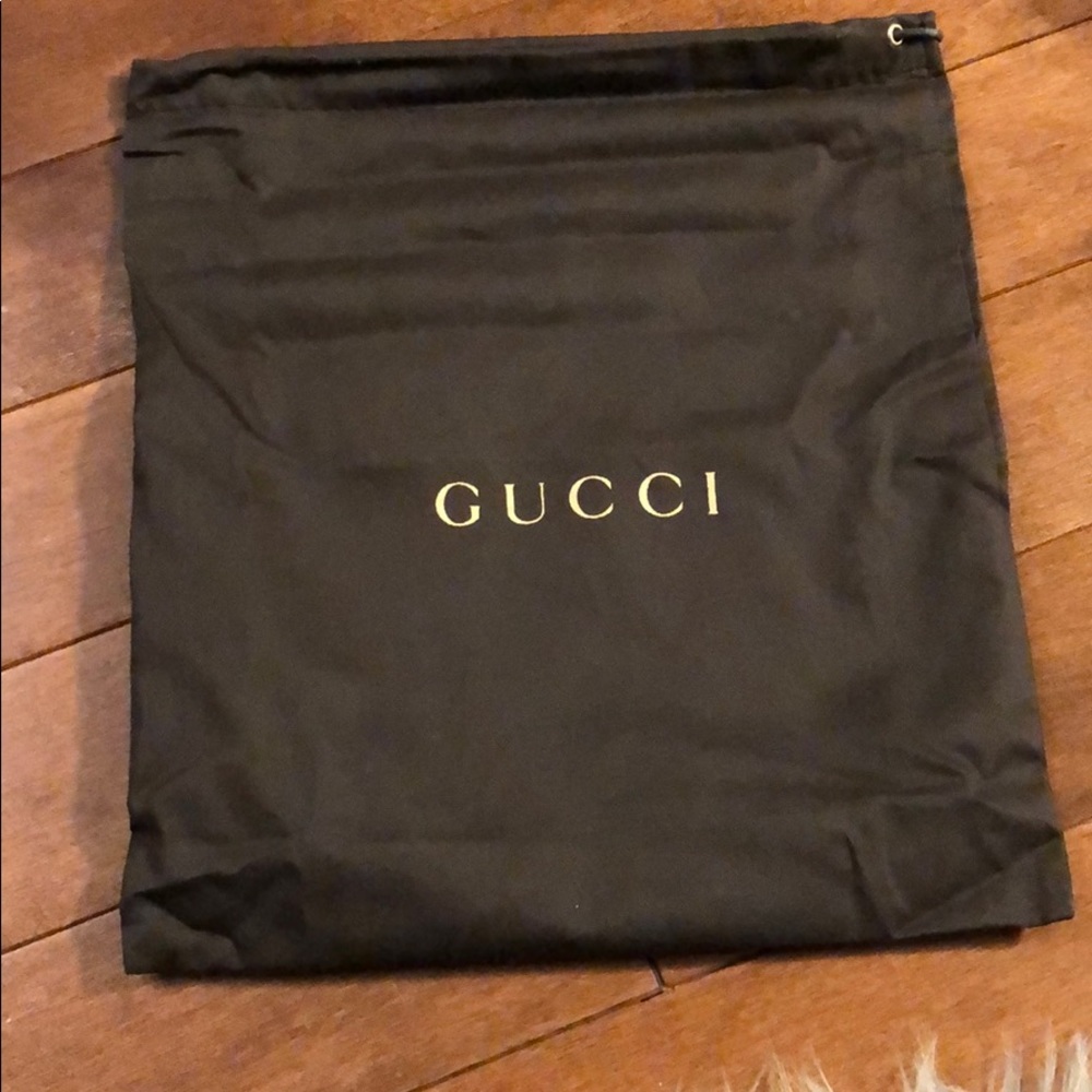 Brown Gucci dust bag